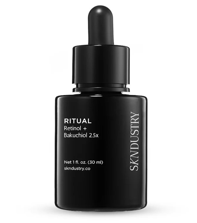 Black dropper bottle of Ritual Retinol + Bakuchiol 2.5x serum, promoting skin transformation and rejuvenation.